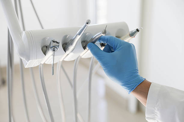 Professional Emergency Dentist technician working in Senatobia, MS